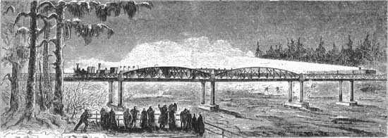 Invigningståget passerar bron över Dalälven vid Älvkarleö december 1874. 